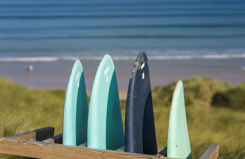 Surfers on the beach at Hayle.